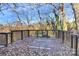 Spacious deck overlooking a wooded area at 835 Belmont Ave, Charlotte, NC 28205