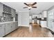 Modern kitchen with white cabinets and granite countertops at 835 Belmont Ave, Charlotte, NC 28205