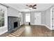 Spacious living room with hardwood floors, fireplace, and neutral decor at 835 Belmont Ave, Charlotte, NC 28205