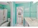 Clean bathroom with teal walls and a shower/tub combo at 8506 Delamere Ln, Charlotte, NC 28269