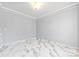 Empty bedroom with marble floors and gray walls at 8506 Delamere Ln, Charlotte, NC 28269