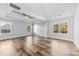 Main bedroom with tray ceiling and hardwood floors at 8506 Delamere Ln, Charlotte, NC 28269