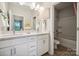 Clean bathroom with a double vanity and a bathtub shower combo at 8625 Miles Gap Rd, Indian Land, SC 29707