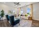 Living room with seating area and large windows at 8625 Miles Gap Rd, Indian Land, SC 29707