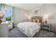 Charming bedroom with a unique headboard and soft color palette at 8627 Miles Gap Rd, Indian Land, SC 29707