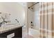 Secondary bathroom with shower/tub combo and modern finishes at 9124 Longvale Ln, Charlotte, NC 28214