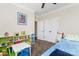 bedroom with built-in shelving and toys at 9124 Longvale Ln, Charlotte, NC 28214