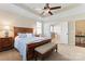 Spacious primary bedroom with ensuite bathroom access and ample natural light at 9124 Longvale Ln, Charlotte, NC 28214