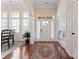 Bright and spacious entryway with hardwood floors and natural light at 9124 Longvale Ln, Charlotte, NC 28214