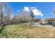 Fenced backyard with patio, grill, and playset at 1009 Chapman St, Indian Trail, NC 28079