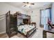 Charming bedroom with a bunk bed and built in desk at 1009 Chapman St, Indian Trail, NC 28079