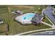 Aerial view of community pool, clubhouse, and playground at 1009 Chapman St, Indian Trail, NC 28079