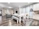 Bright dining area with white table and built-in shelving at 1009 Chapman St, Indian Trail, NC 28079