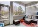 Relaxing screened porch with comfy seating and outdoor access at 1009 Chapman St, Indian Trail, NC 28079