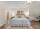 Cozy bedroom with a comfortable bed, stylish furnishings, and two abstract paintings on the wall at 10200 Amsterdam Dr, Mount Pleasant, NC 28124