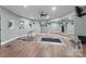 Spacious home gym with mirrored walls and exercise equipment at 10200 Amsterdam Dr, Mount Pleasant, NC 28124