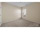 Simple bedroom with neutral walls and carpet at 1024 Knob Creek Ln, Fort Mill, SC 29708