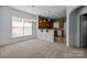 Dining area with a view of the kitchen and plenty of natural light at 1024 Knob Creek Ln, Fort Mill, SC 29708