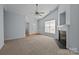 Bright and airy living room with a fireplace and access to entryway at 1024 Knob Creek Ln, Fort Mill, SC 29708