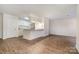 Galley kitchen with granite countertops and white cabinets at 10240 Rose Meadow Ln # D, Charlotte, NC 28277