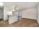 Kitchen with granite countertops and white cabinets at 10240 Rose Meadow Ln # D, Charlotte, NC 28277