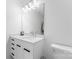 Modern bathroom with white vanity, large mirror, and updated fixtures at 109 Myers Port Way # 2, Mooresville, NC 28117