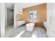 Bathroom with freestanding tub and marble floors at 109 Myers Port Way # 2, Mooresville, NC 28117