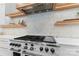 Modern kitchen with stainless steel range and herringbone tile at 109 Myers Port Way # 2, Mooresville, NC 28117