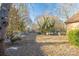 Backyard view with shed and trees at 110 Robin Rd, Lincolnton, NC 28092