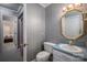 Small half bathroom with toilet and vanity at 110 Robin Rd, Lincolnton, NC 28092