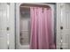 Small bathroom with shower/tub combo and pink curtain at 110 Robin Rd, Lincolnton, NC 28092