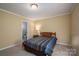 Bedroom with double bed, nightstand, and ensuite bathroom at 110 Robin Rd, Lincolnton, NC 28092