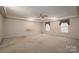 Spacious bedroom with ceiling fan and carpet at 110 Robin Rd, Lincolnton, NC 28092