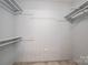 Large walk-in closet with double hanging rods and shelves at 110 Robin Rd, Lincolnton, NC 28092