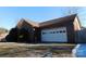 Attached brick garage with a white door at 110 Robin Rd, Lincolnton, NC 28092