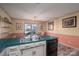 Kitchen features a double sink and dishwasher at 110 Robin Rd, Lincolnton, NC 28092