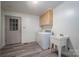 Laundry room with washer, dryer, and utility sink at 110 Robin Rd, Lincolnton, NC 28092