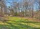 Spacious backyard with large grassy area at 1147 Bloom Wood Ln, Matthews, NC 28105