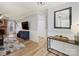 Bright living room with hardwood floors and a fireplace at 1147 Bloom Wood Ln, Matthews, NC 28105