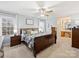 Spacious primary bedroom with en-suite bathroom and ample closet space at 1147 Bloom Wood Ln, Matthews, NC 28105