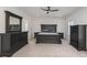 Spacious bedroom with dark wood furniture and carpeted floors at 12060 Mariners Cove Ct, Lancaster, SC 29720