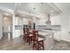 Modern kitchen with white cabinets, granite countertops, and stainless steel appliances at 12060 Mariners Cove Ct, Lancaster, SC 29720