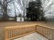 Private backyard with storage shed and wooden deck at 1219 Stevens Cir, Gastonia, NC 28054