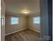 Spacious bedroom with neutral walls and laminate flooring at 1219 Stevens Cir, Gastonia, NC 28054