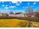 Backyard with wooden fence and grassy area at 124 Zolder Ln # 15, Mooresville, NC 28117