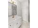 Bathroom with white vanity, a large mirror, and a shower/tub combo at 124 Zolder Ln # 15, Mooresville, NC 28117