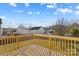 Wooden deck overlooks fenced-in backyard at 124 Zolder Ln # 15, Mooresville, NC 28117