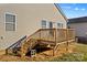 Elevated deck with wooden stairs and backyard view at 124 Zolder Ln # 15, Mooresville, NC 28117