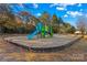 Community playground with swings, slides, and climbing structures at 124 Zolder Ln # 15, Mooresville, NC 28117