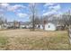 Large backyard with a spacious grassy area at 14023 Kedleston Rd, Huntersville, NC 28078